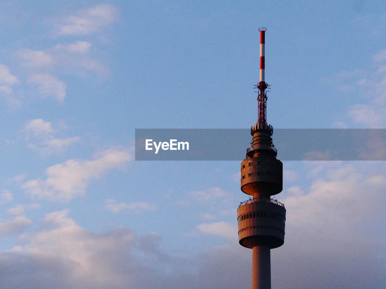 Low angle view of television tower against sky