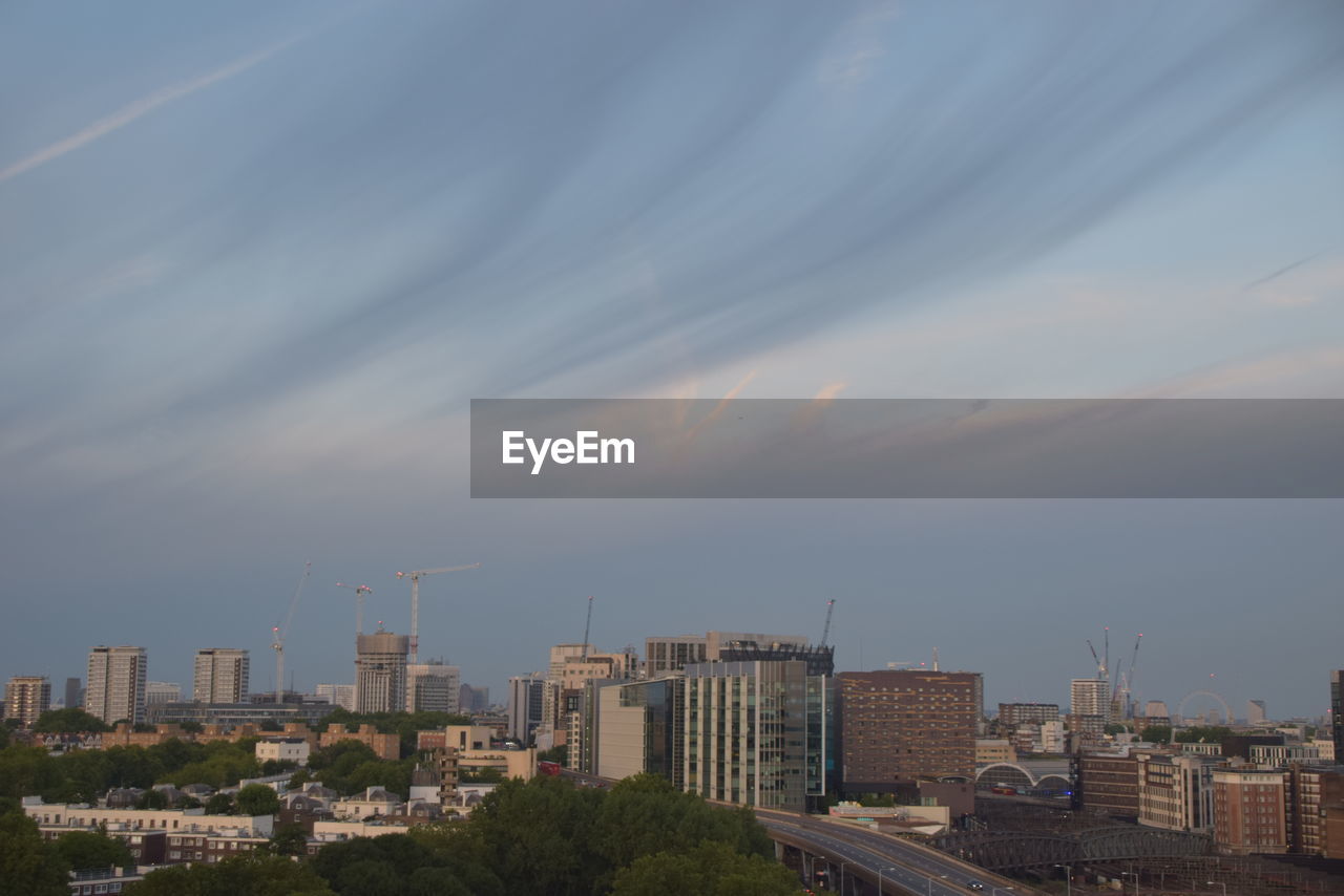 MODERN BUILDINGS AGAINST SKY IN CITY