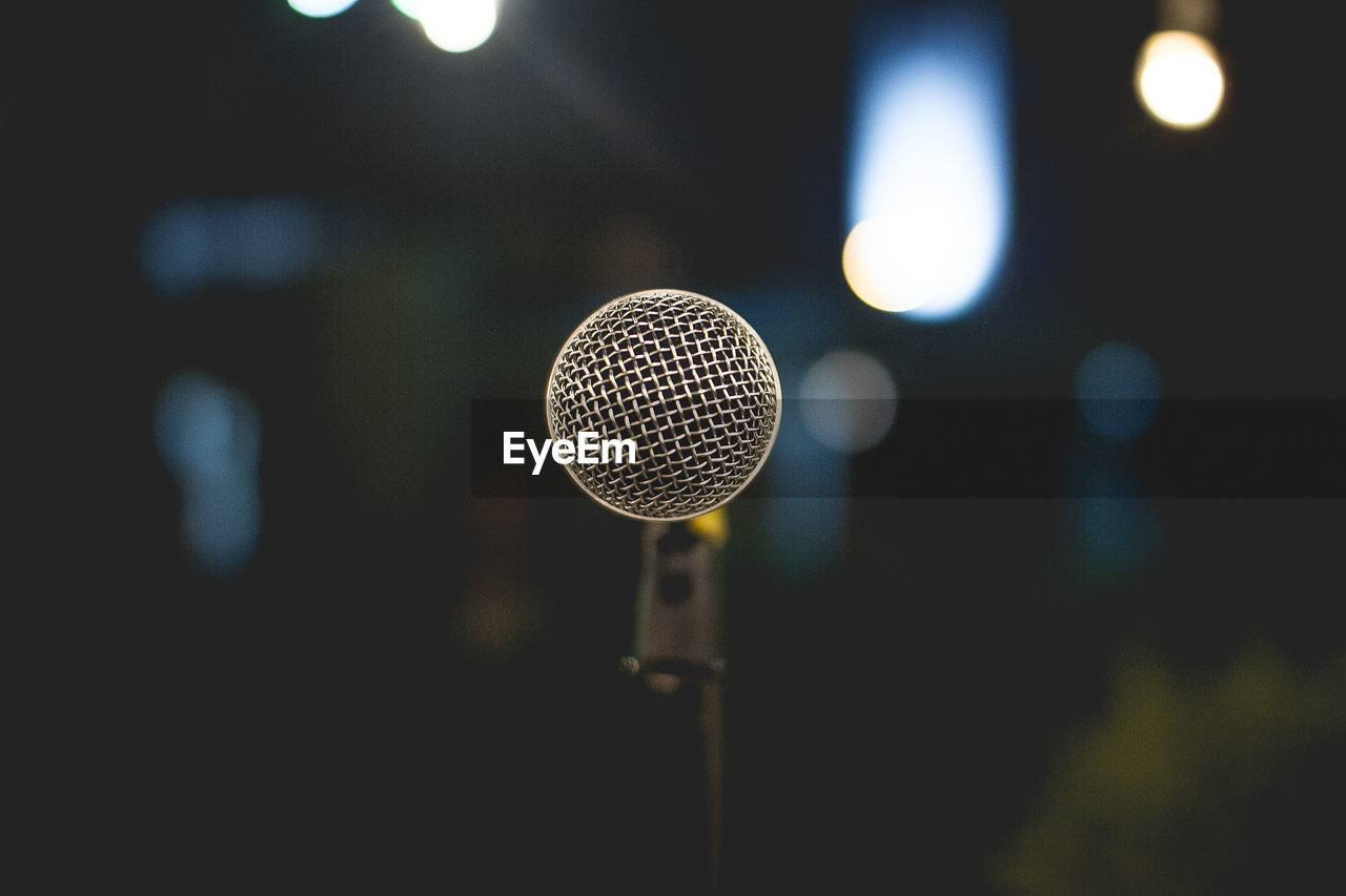 Close-up of microphone at nightclub