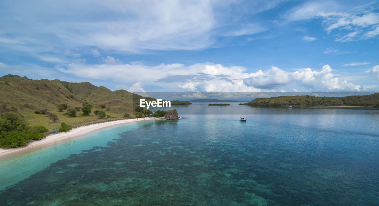 Clear sea view with hill and beach background photographed from above