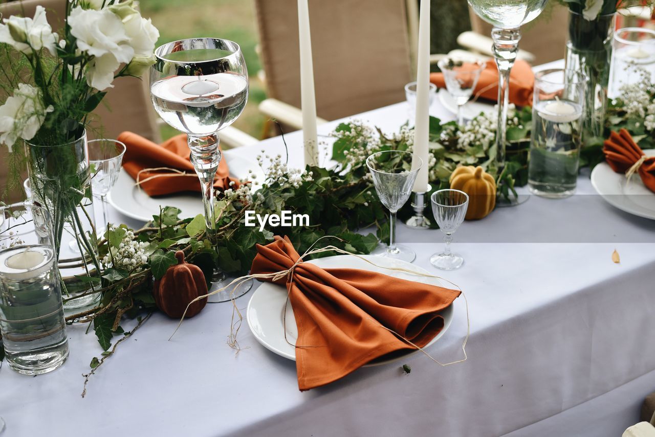 View of  table setting with orange decoration