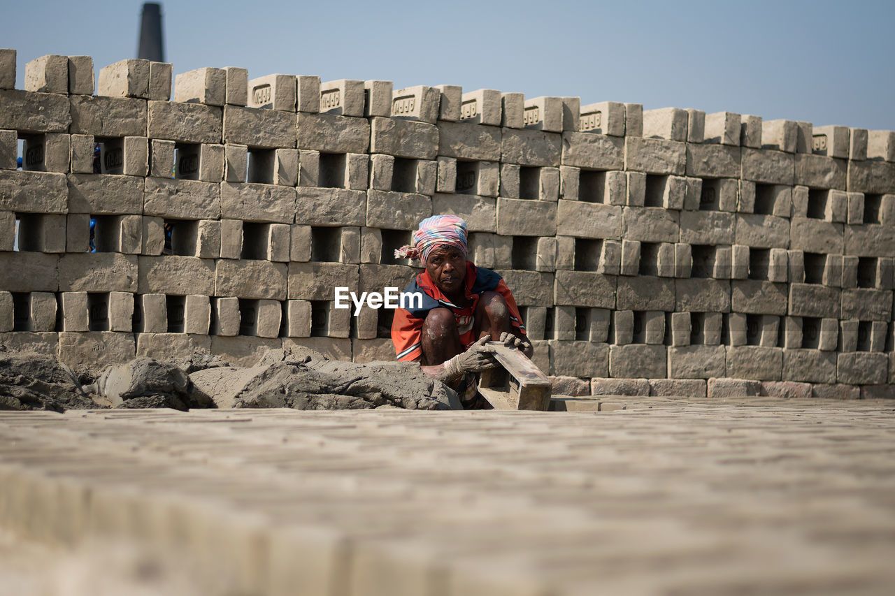 Surface level of man working outdoors