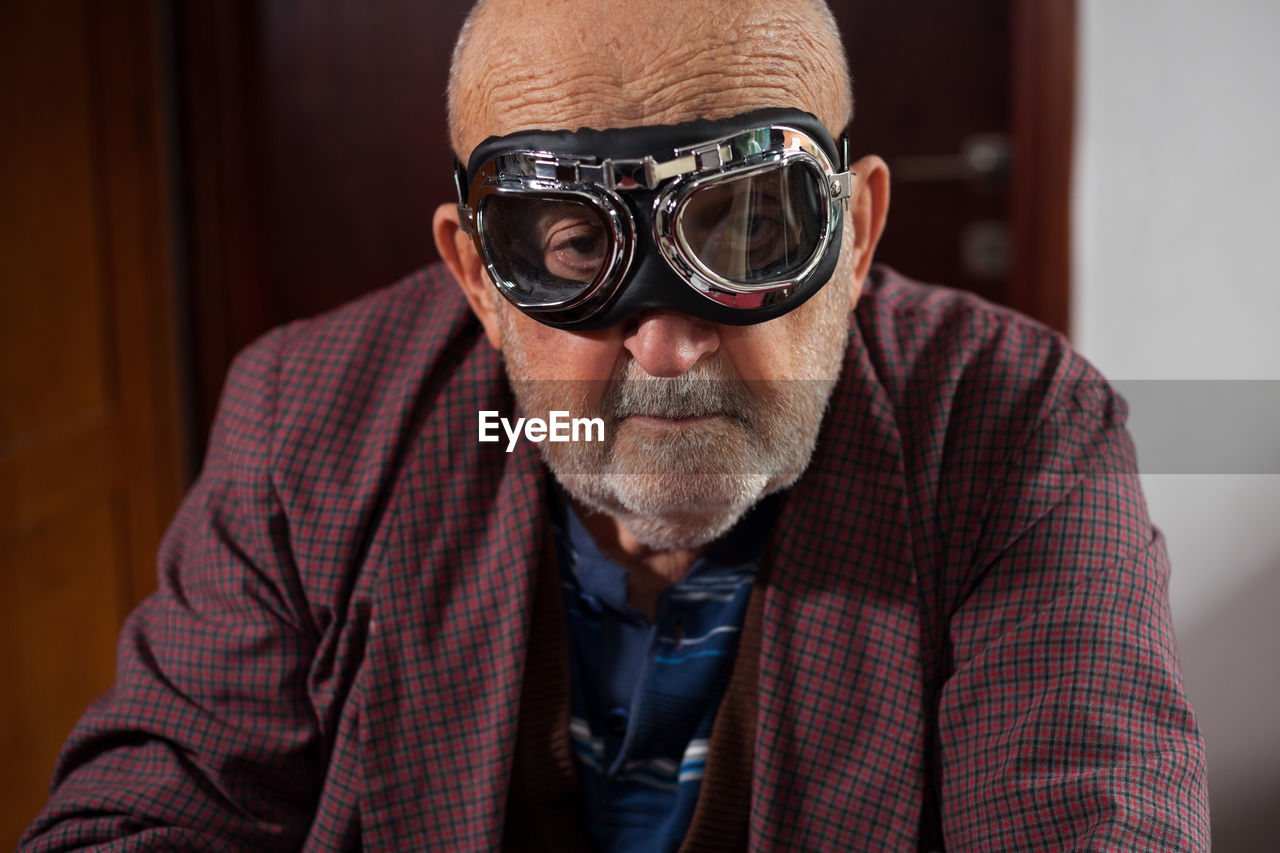 Portrait of senior man wearing goggles