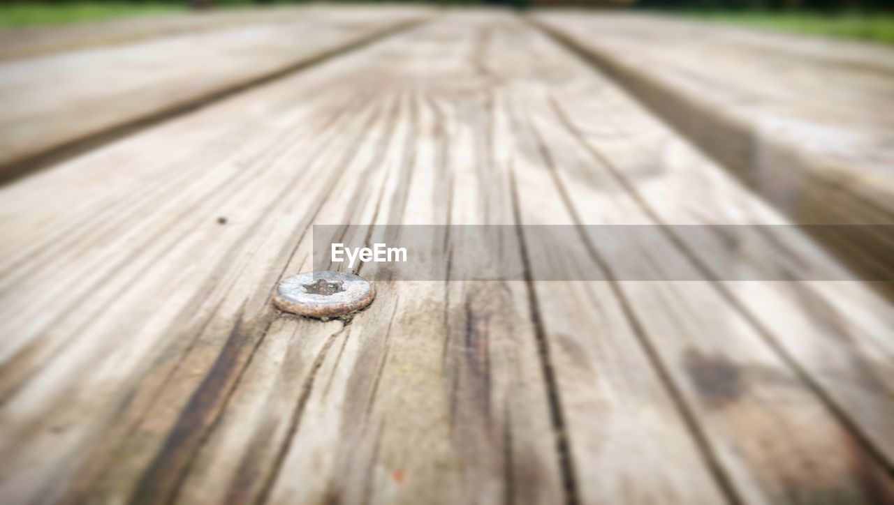 CLOSE-UP OF WOOD ON WOODEN SURFACE