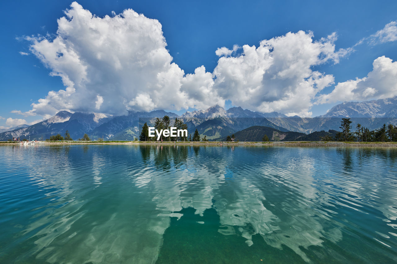 Mountain lake reflecting alps