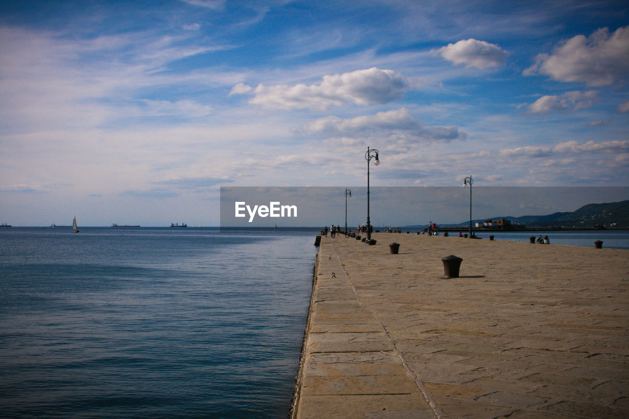 SCENIC VIEW OF PIER OVER SEA AGAINST SKY