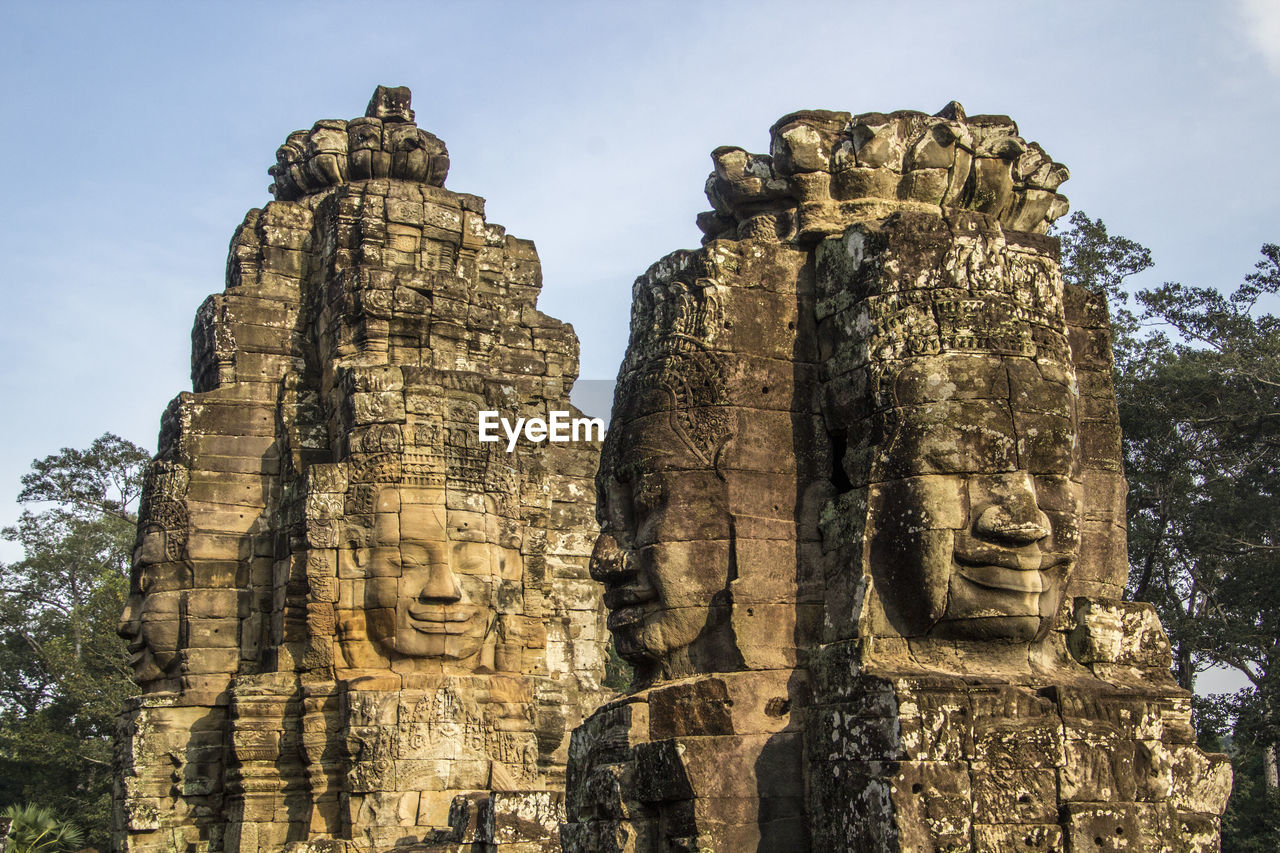 LOW ANGLE VIEW OF A STATUE OF TEMPLE