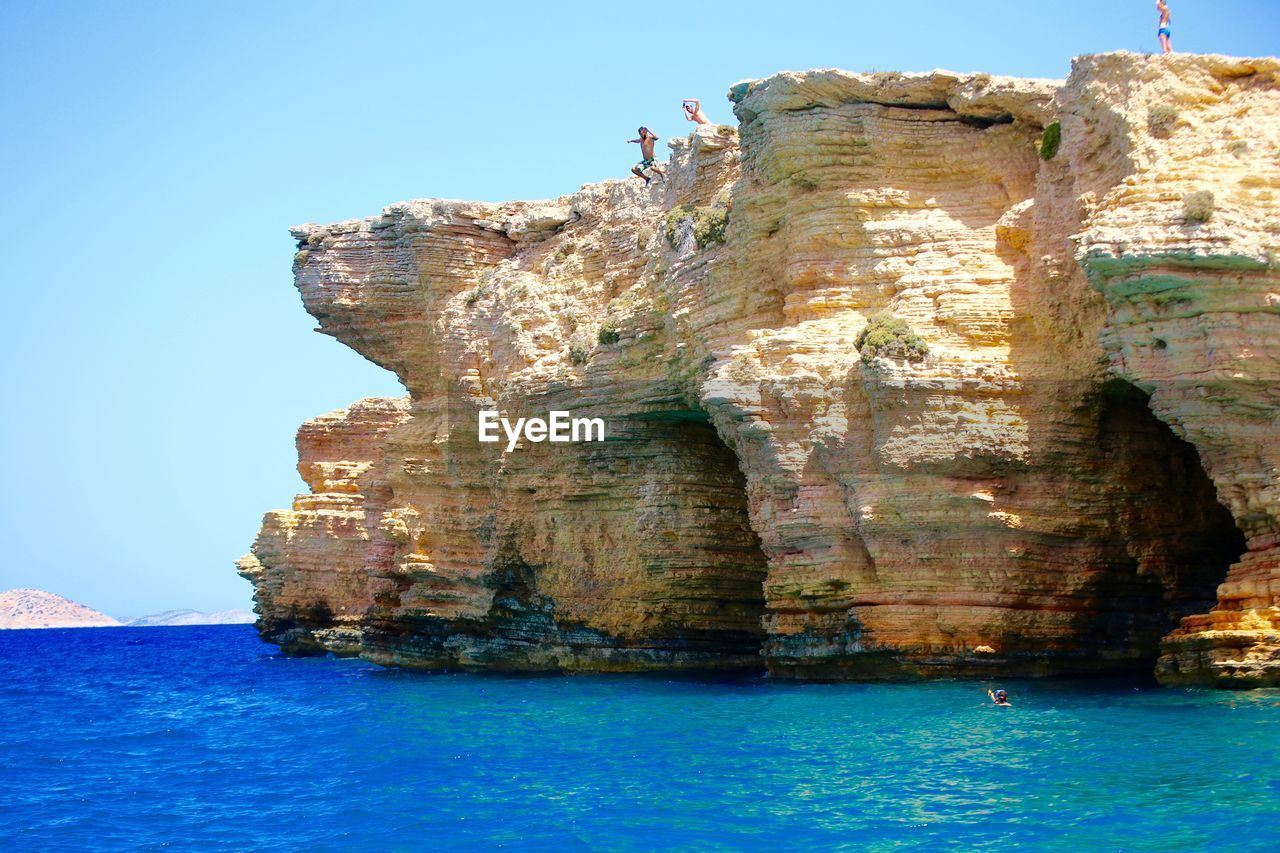 Scenic view of sea against blue sky