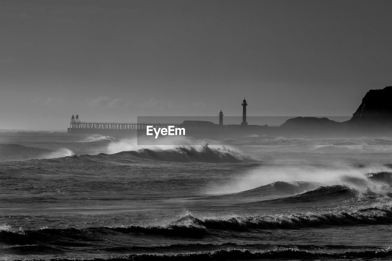 Scenic view of sea against sky whitby rough seas