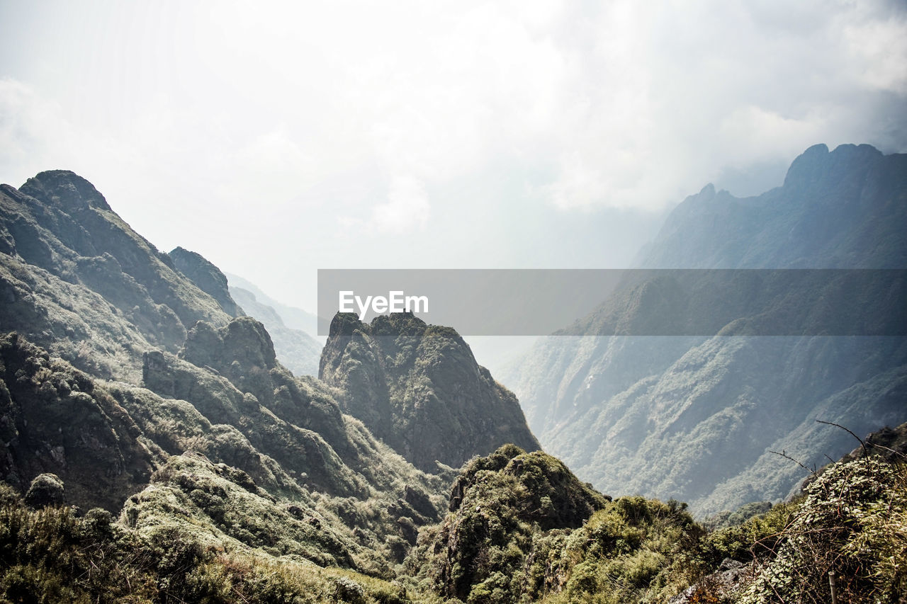 Scenic view of mountains against sky