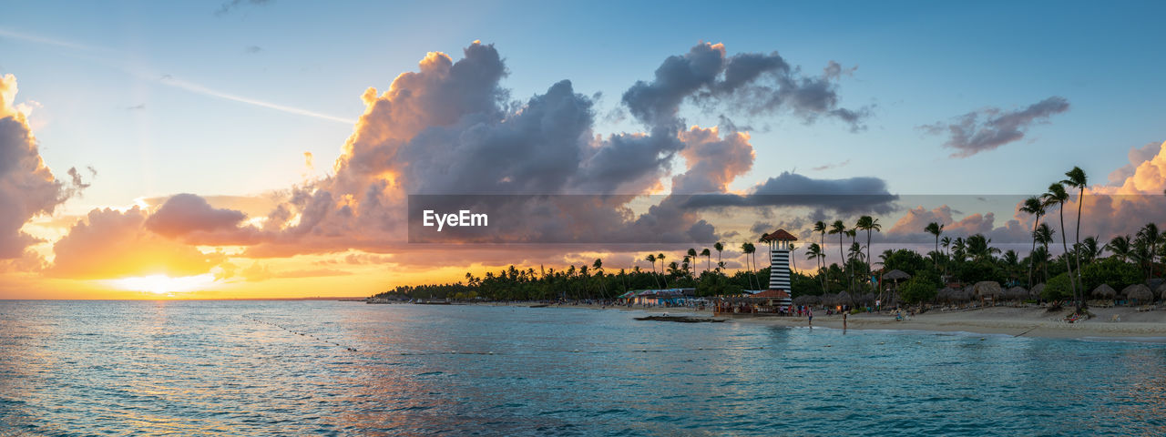 PANORAMIC VIEW OF SEA AGAINST SKY AT SUNSET