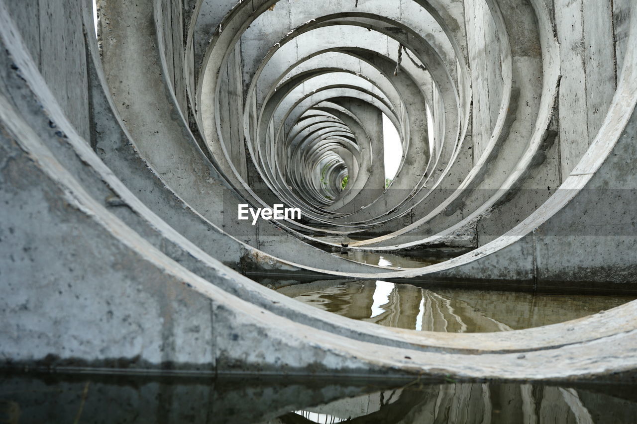 LOW ANGLE VIEW OF SPIRAL STAIRCASE