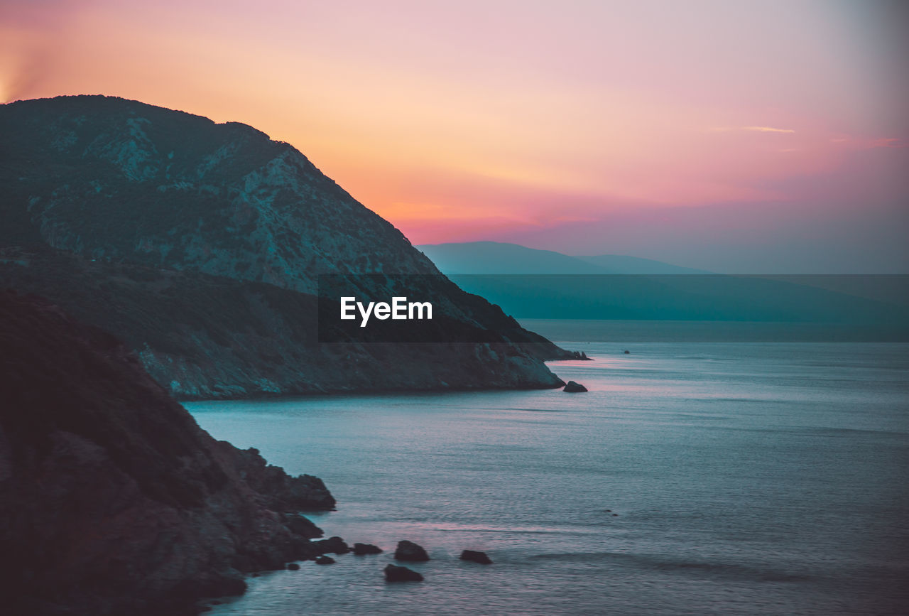 Scenic view of sea against sky during sunset