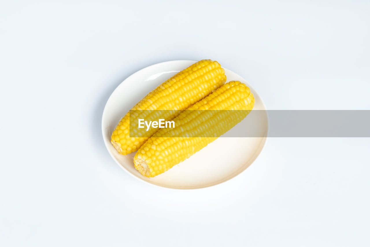 sweet corn, corn kernels, food, food and drink, yellow, corn, healthy eating, vegetable, wellbeing, studio shot, indoors, white background, freshness, no people, produce, cut out, single object, organic, close-up, raw food, crop, agriculture, pill, vitamin, high angle view