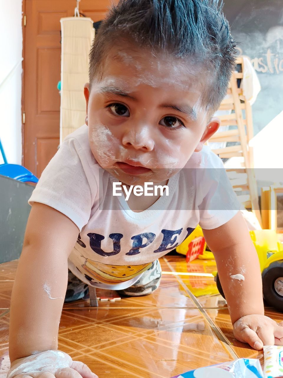 Portrait of cute little baby at home