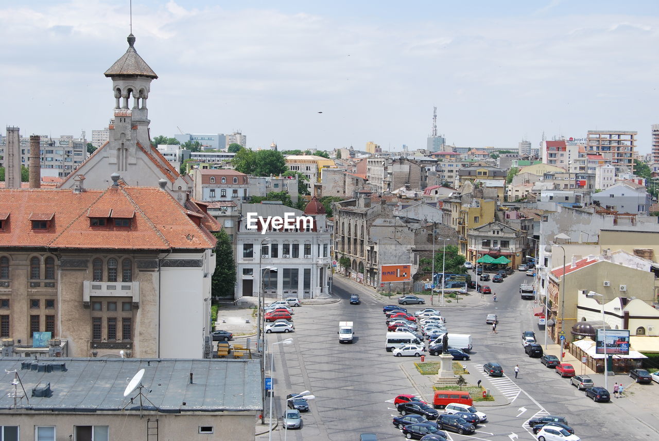 High angle view of street amidst buildings in city