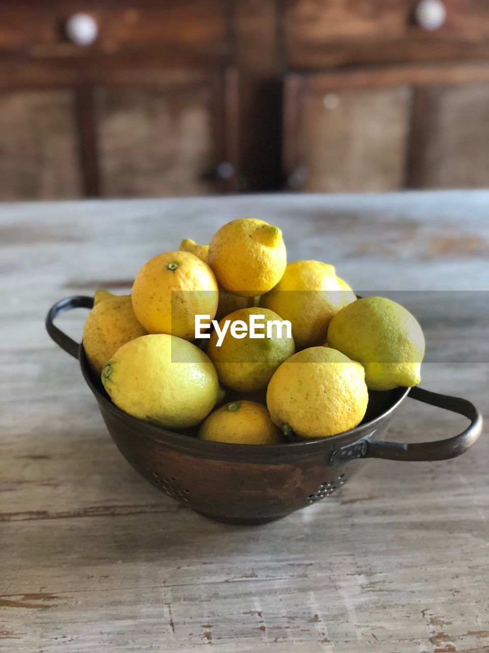 CLOSE-UP OF FRUITS ON TABLE