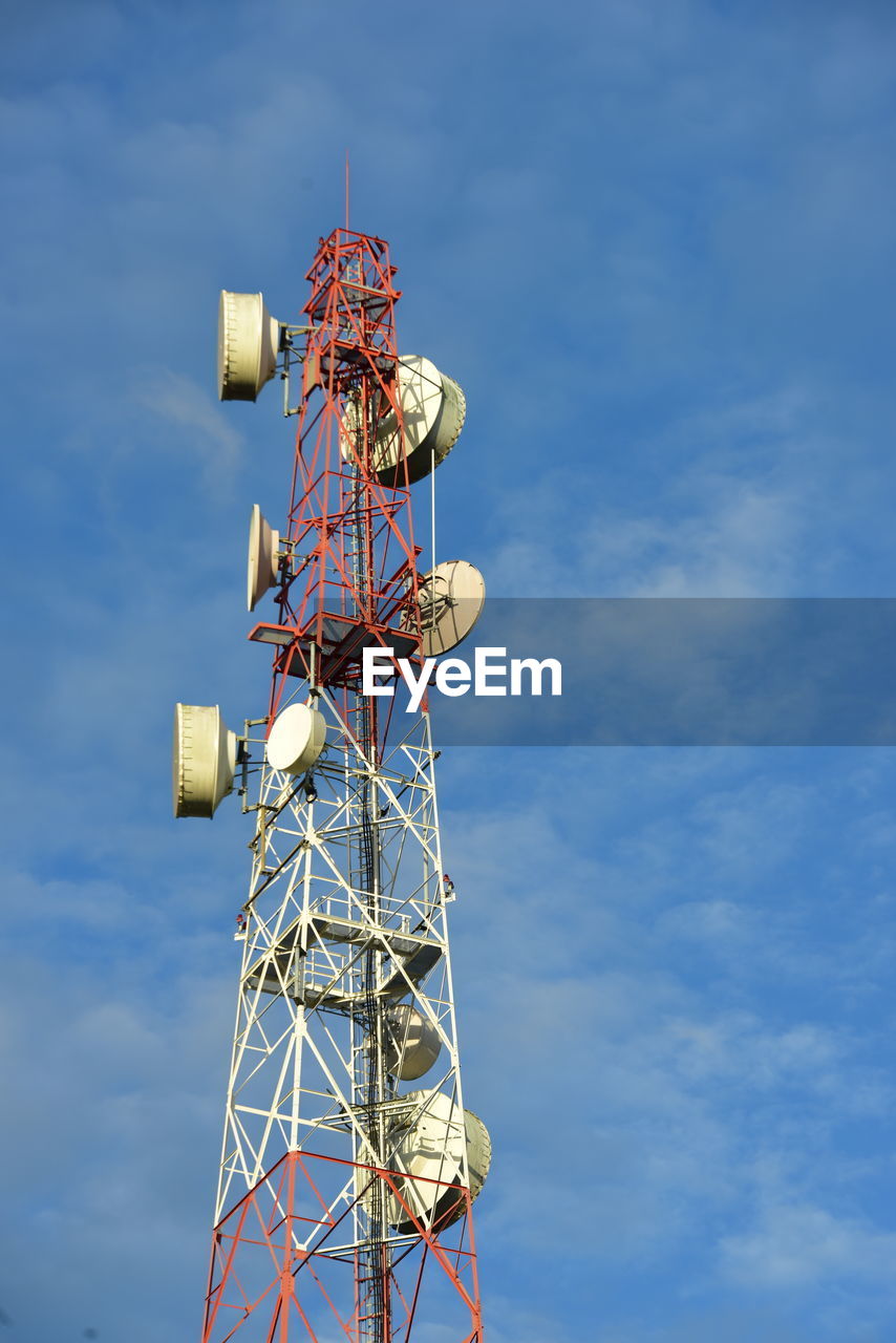 sky, blue, global communications, technology, wireless technology, communication, cloud, telecommunications engineering, satellite, low angle view, broadcasting, satellite dish, telecommunications equipment, computer network, nature, no people, communications tower, internet, architecture, electricity, vehicle, antenna, outdoors, day, built structure, business, copy space, metal