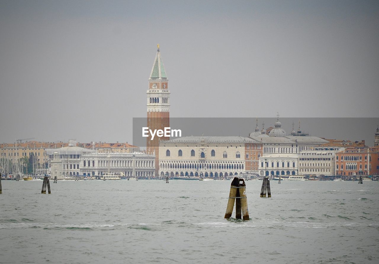 Grand canal against san marco campanile and buildings in town