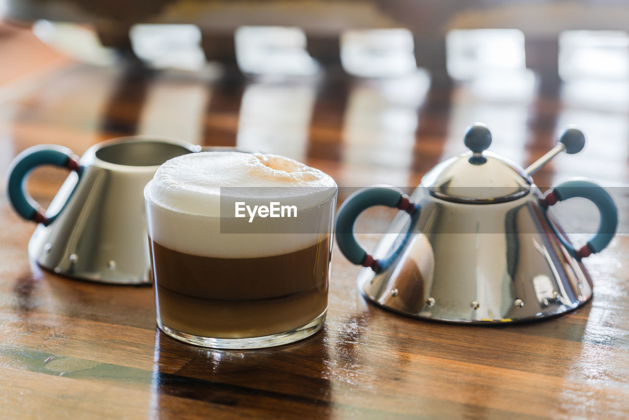 Close-up of coffee cup on table