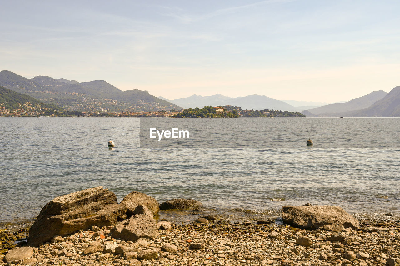 SCENIC VIEW OF SEA AND MOUNTAINS