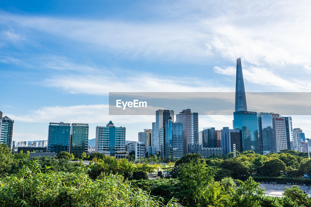 modern buildings in city against sky