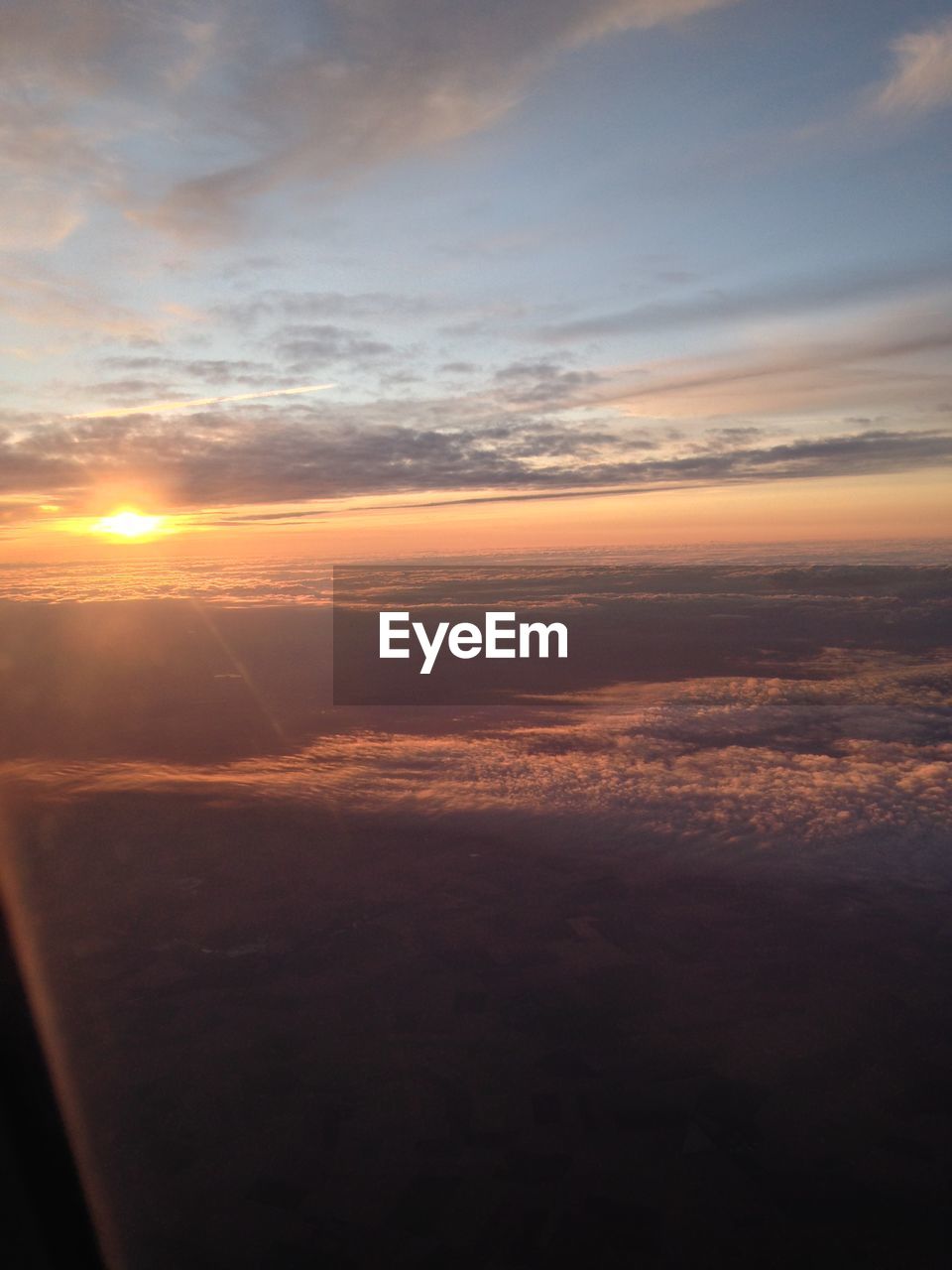 SUNSET OVER LANDSCAPE