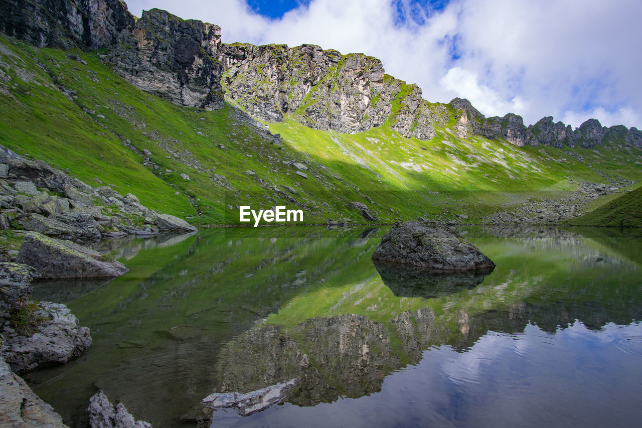 Scenic view of rocks against sky