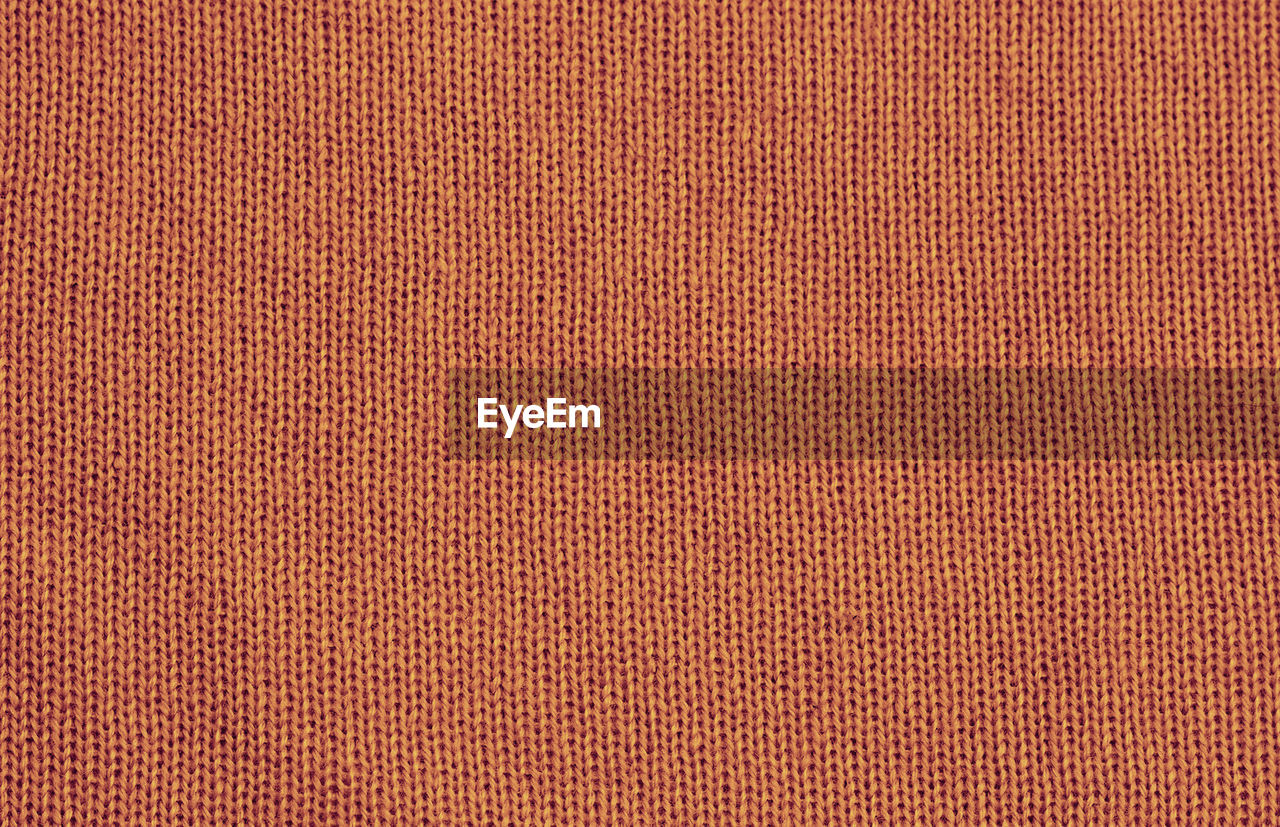 Full frame shot of brown sweater