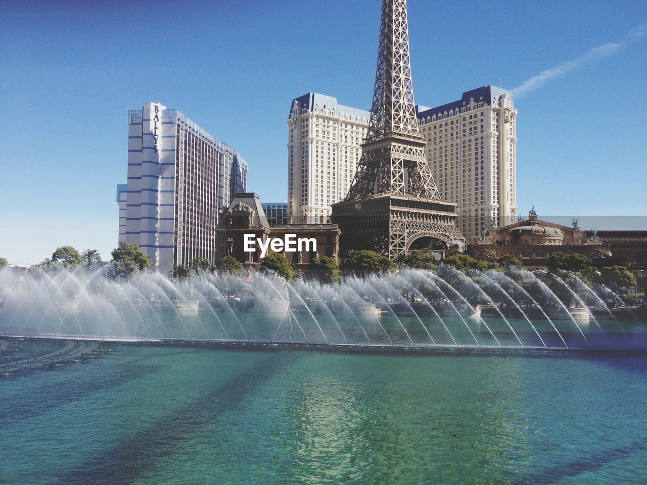 View of fountain with skyscrapers in background