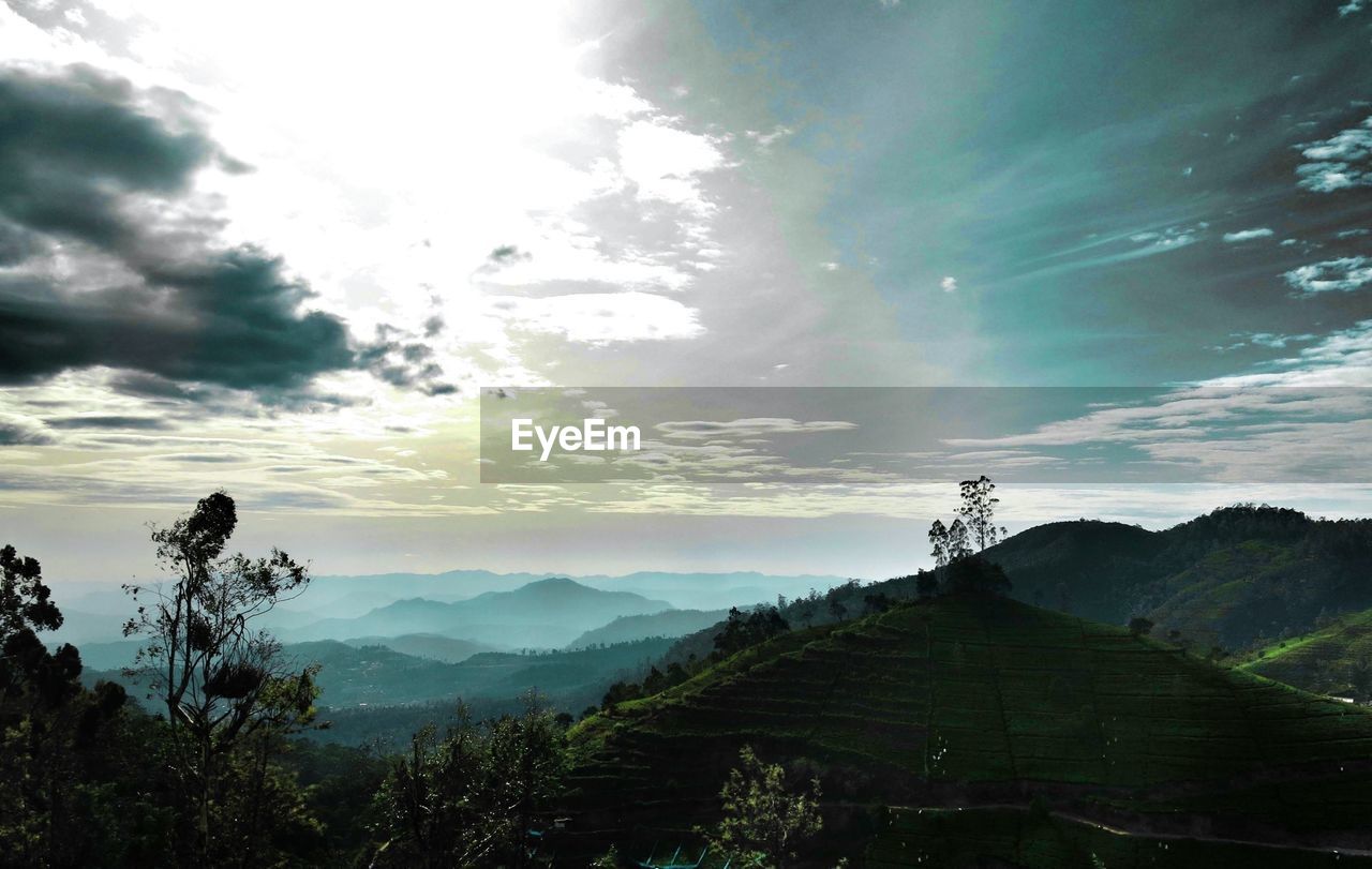 Idyllic shot of mountains against sky during sunset