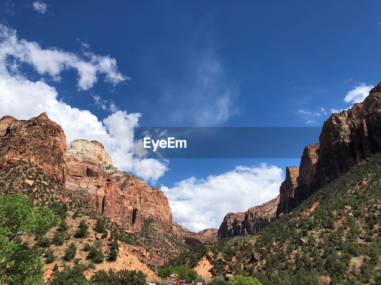 Low angle view of rock formations against sky