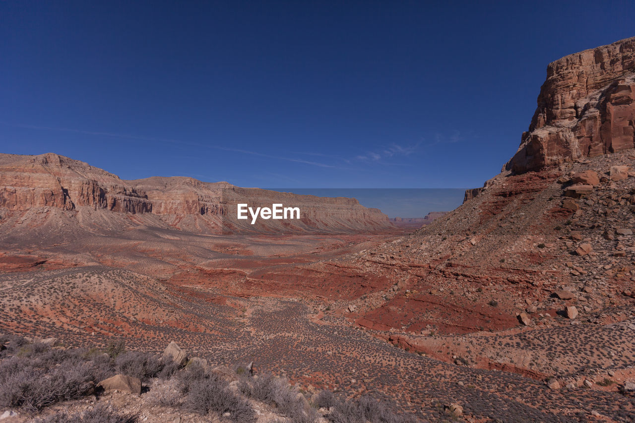 Scenic view of grand canyon national park against blue sky