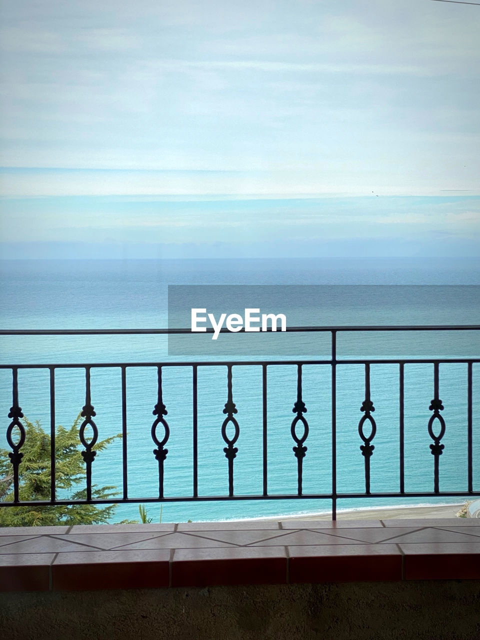 SCENIC VIEW OF SWIMMING POOL AGAINST SEA