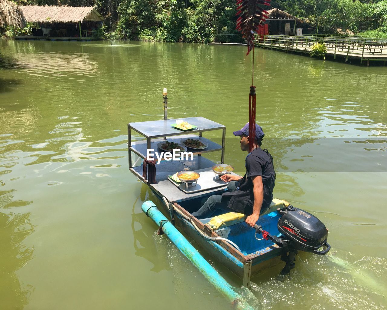 MAN ON BOAT