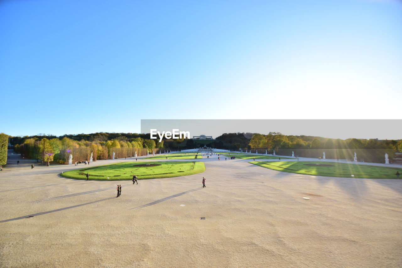 SCENIC VIEW OF LANDSCAPE AGAINST BLUE SKY