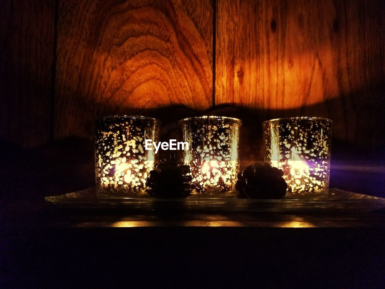 Close-up of illuminated decoration on table