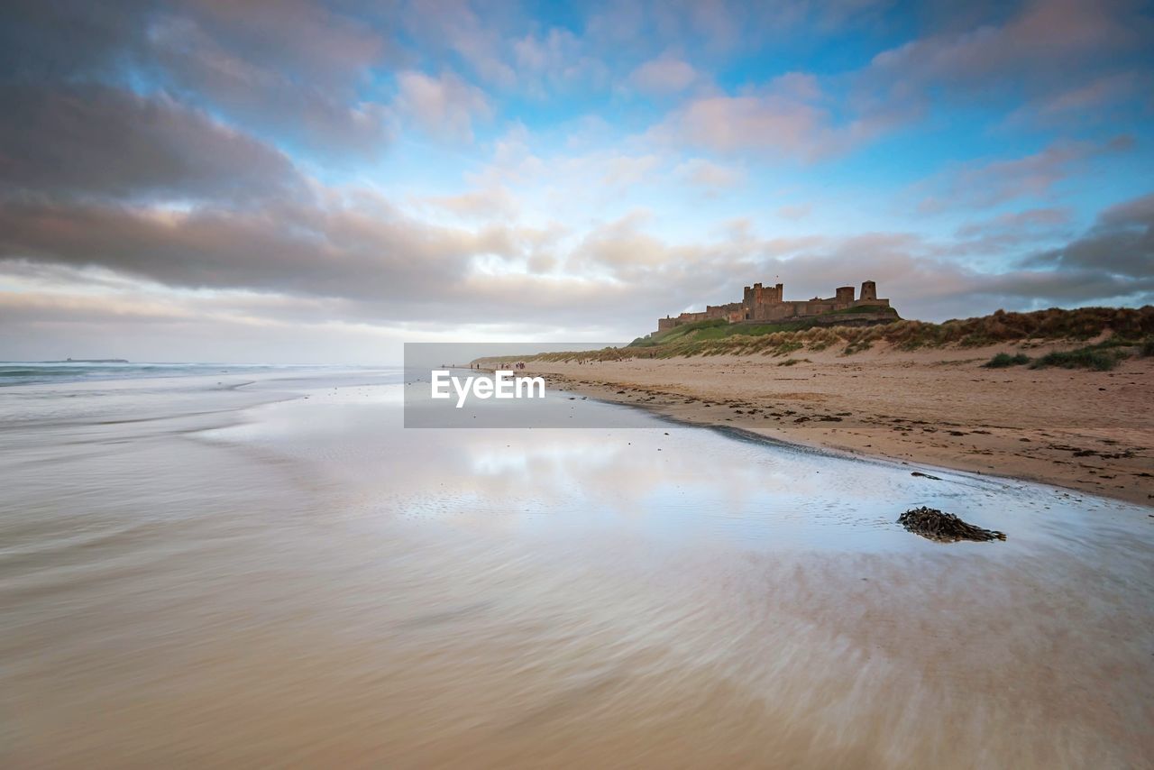 Scenic view of beach against sky