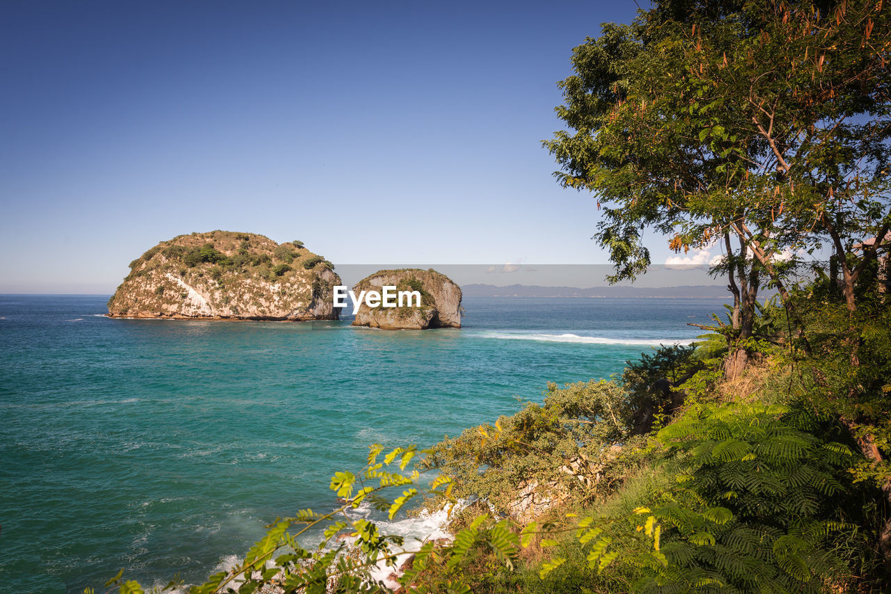 Scenic view of sea against clear sky