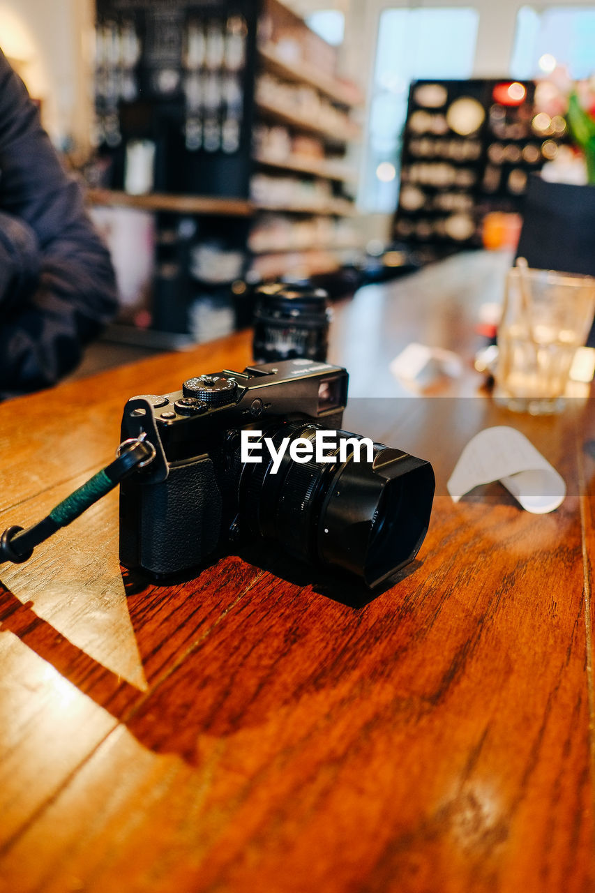 Close-up of camera on table