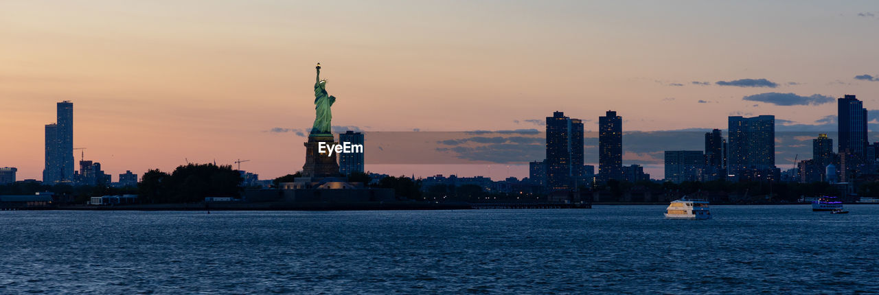 Statute of liberty at sunset