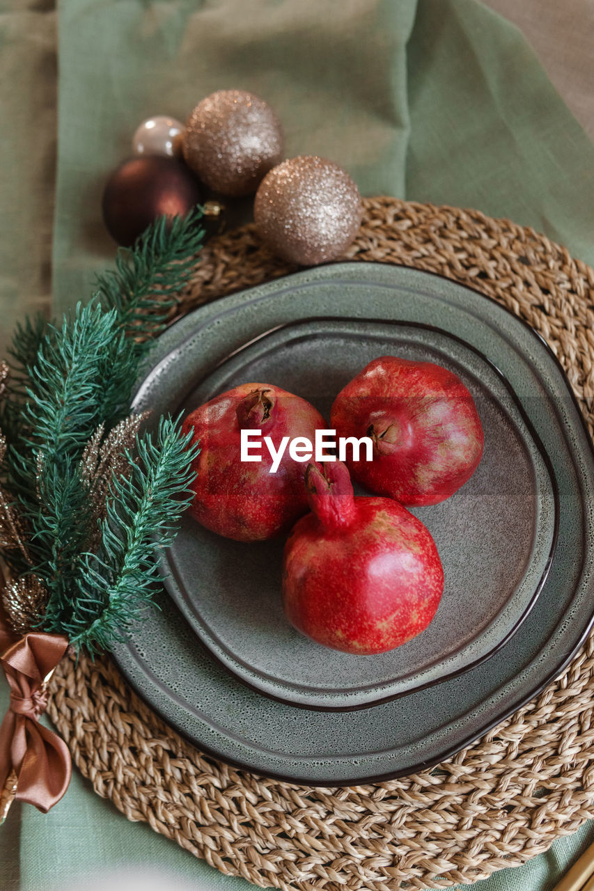 Serving a festive christmas table in scandinavian style. decor on the table before the holiday