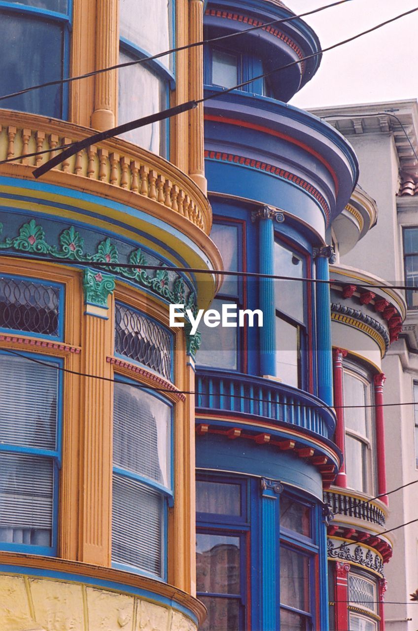CLOSE UP OF BUILDING WITH CITY