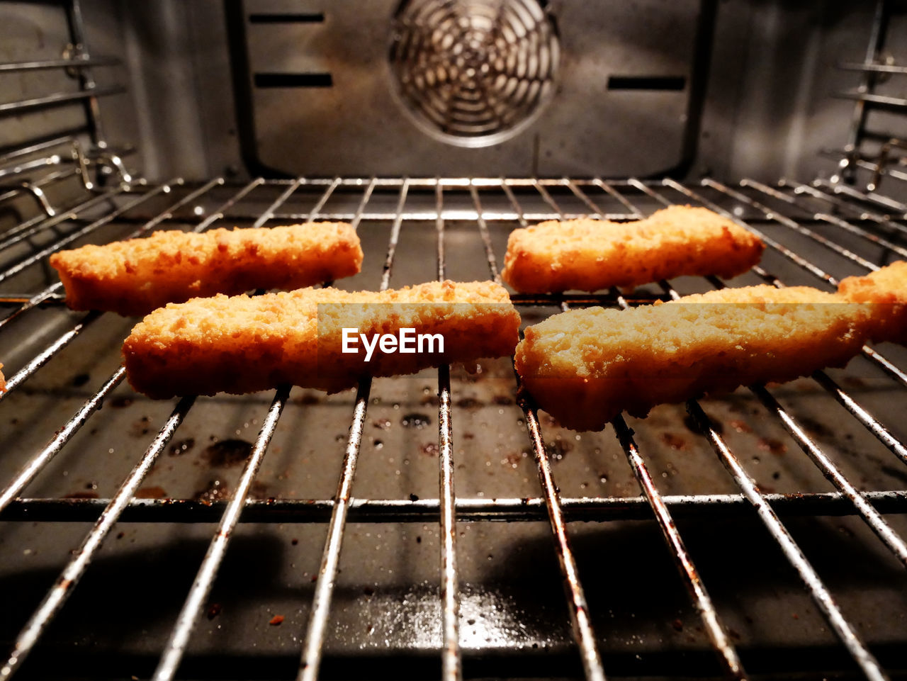 Close-up of fish fingers in oven