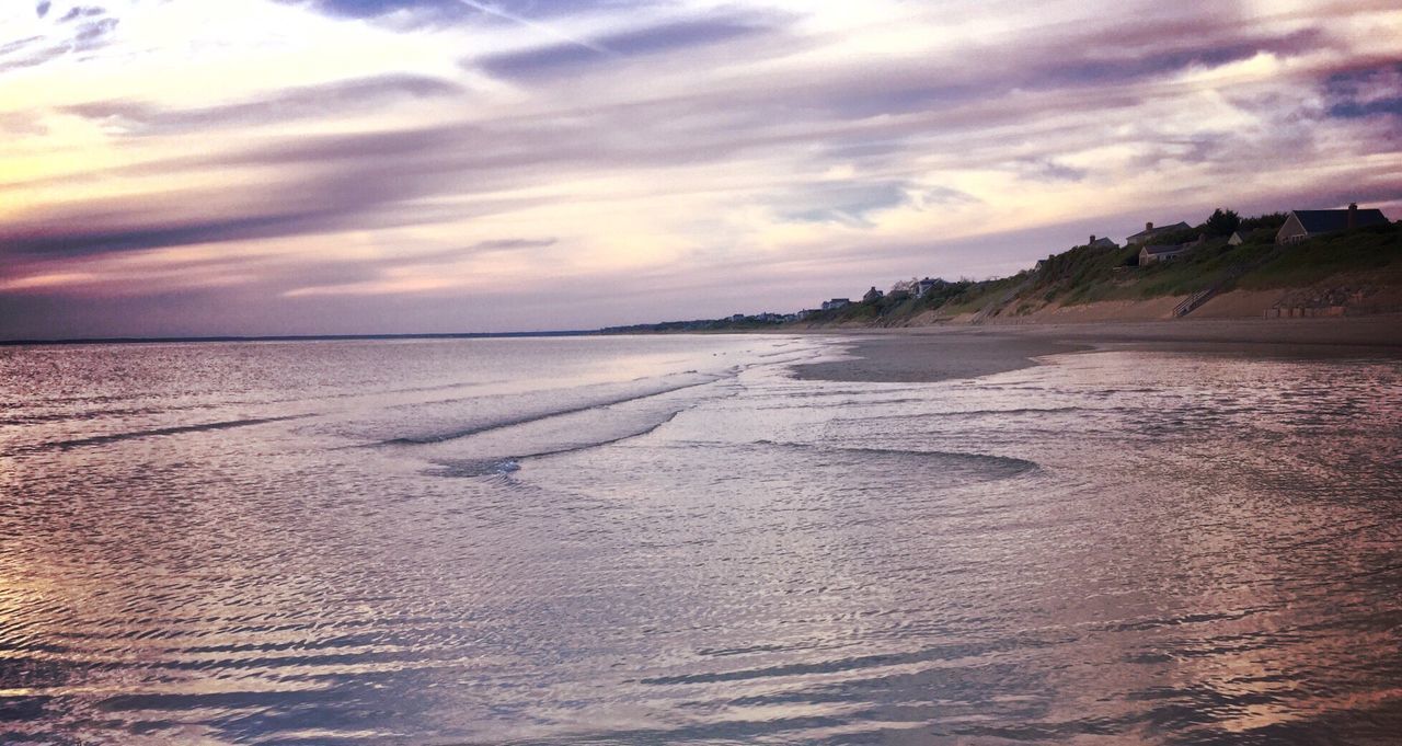 Scenic view of sea against sky at sunset