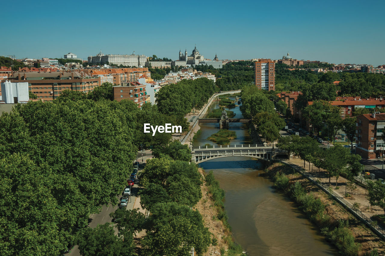 Landscape with the royal palace, almudena cathedral and manzanares river in madrid, spain.