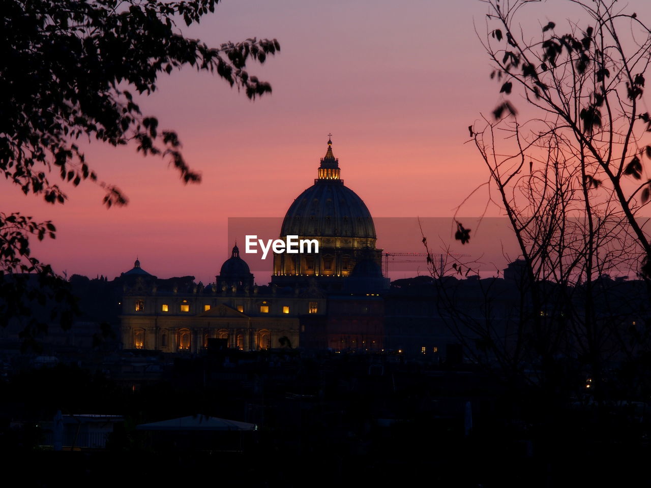 SILHOUETTE OF CATHEDRAL AGAINST SKY DURING SUNSET