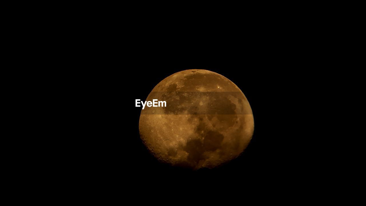 MOON AGAINST CLEAR SKY AT NIGHT