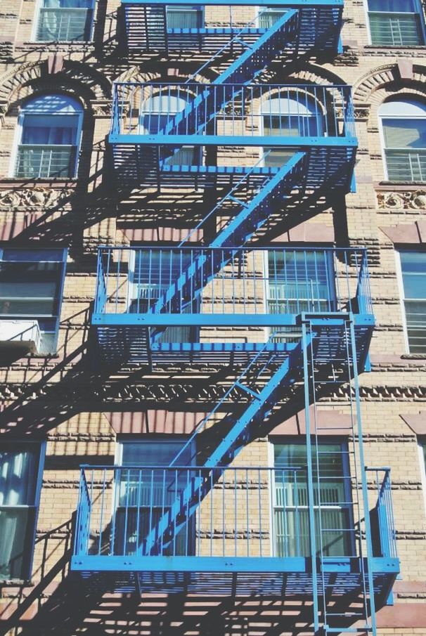 LOW ANGLE VIEW OF RESIDENTIAL BUILDING