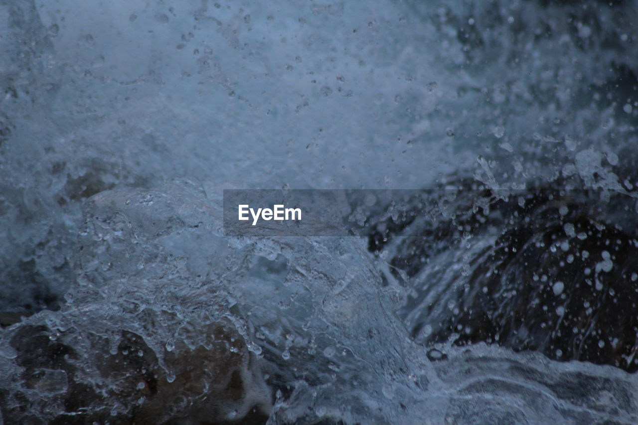 CLOSE-UP OF WATER AGAINST SKY